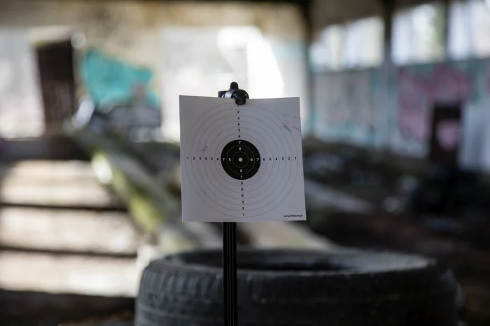 Paper shooting target on stand