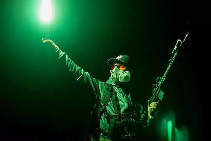 airsoft player in the green light